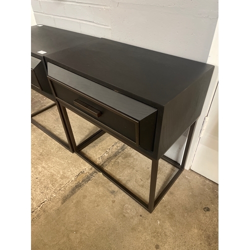 1378 - A pair of black lamp tables