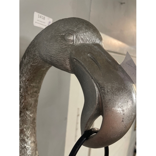 1379 - A silver wall mounted flamingo lamp