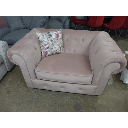 1422 - An Abbey cherry blossom velvet upholstered snuggler chair - RRP £610