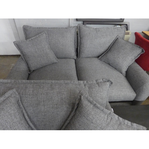 1425 - A mid grey textured weave upholstered 2.5 seater sofa and oversized armchair