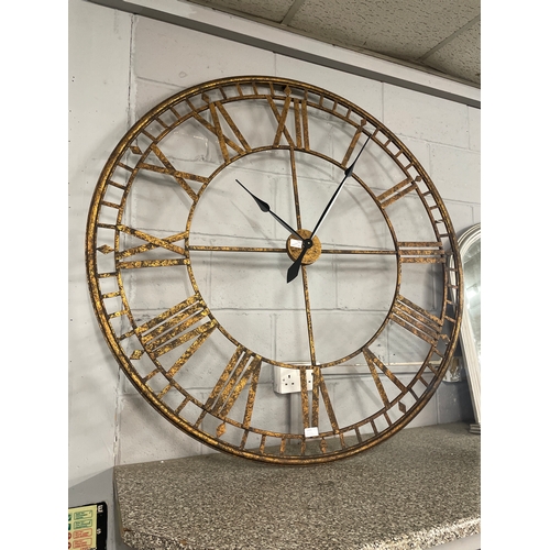 1439 - A large gold skeleton clock