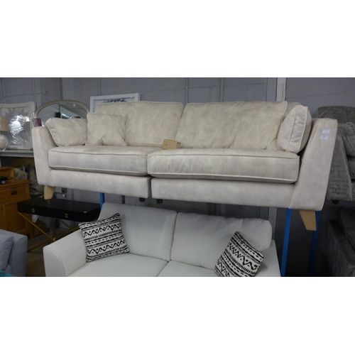 1455 - A Rene sandstone shark skin effect four seater splitter sofa - RRP £1625