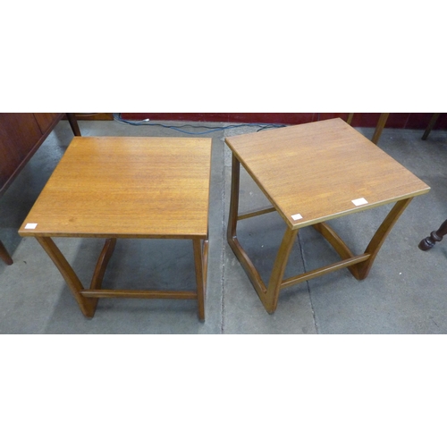 12 - A pair of teak occasional tables