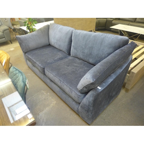 1448 - A blue velvet Barker & Stonehouse three seater sofa