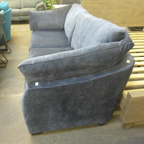 1448 - A blue velvet Barker & Stonehouse three seater sofa