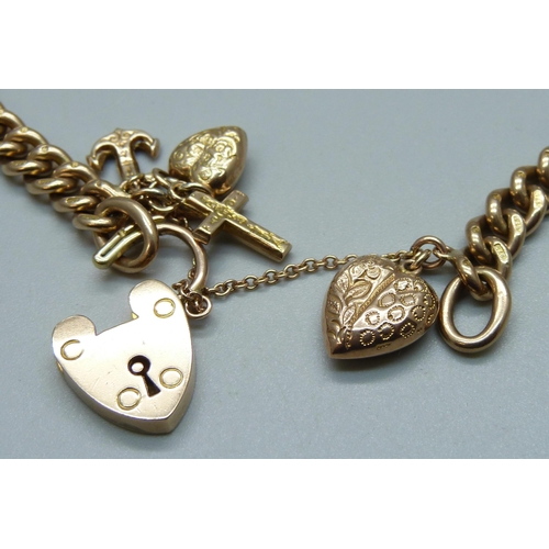 1007 - A 9ct gold curb chain bracelet, each link marked, with a faith, hope and charity charm and heart cha... 