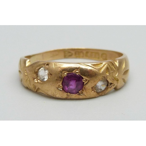 1015 - A 15ct gold ring set with a ruby and two white stones (one replaced), Chester 1899, 3.2g, O