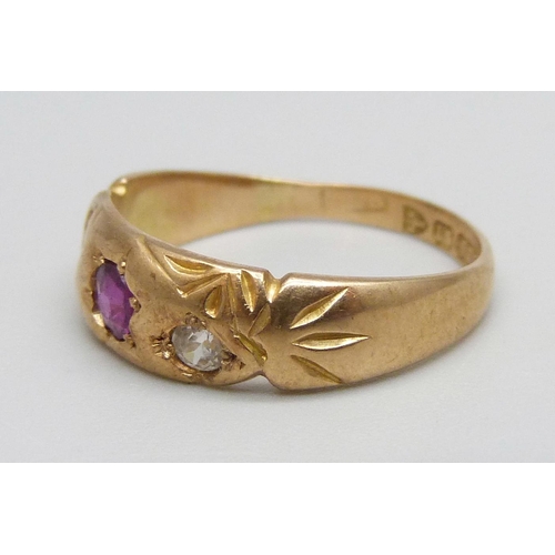 1015 - A 15ct gold ring set with a ruby and two white stones (one replaced), Chester 1899, 3.2g, O