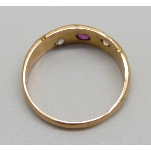 1015 - A 15ct gold ring set with a ruby and two white stones (one replaced), Chester 1899, 3.2g, O