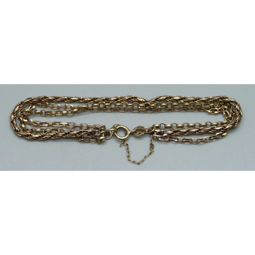 1019 - A 9ct gold triple strand bracelet, 5.8g