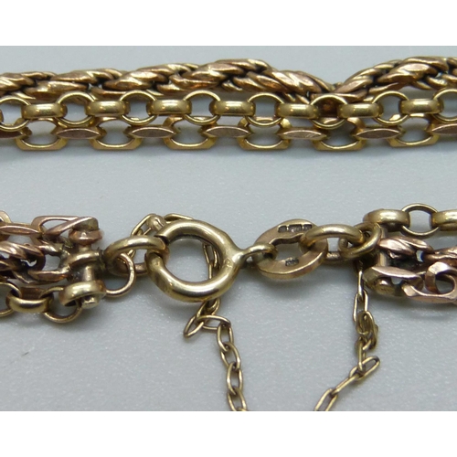 1019 - A 9ct gold triple strand bracelet, 5.8g