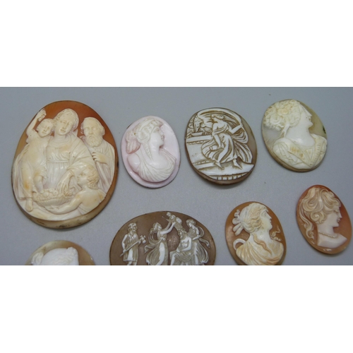 1023 - Eight carved cameos including one angel skin, largest 6cm, and a scene mounted on a gemstone depicti... 