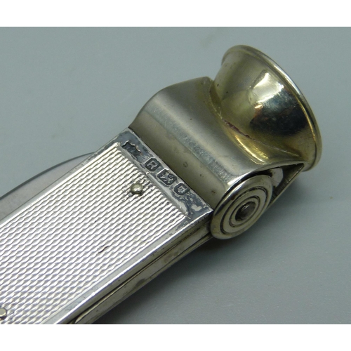 1025 - A silver cigar cutter, London, 1952, 40g