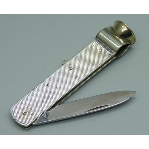 1025 - A silver cigar cutter, London, 1952, 40g