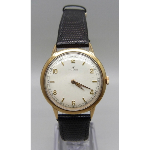 1027 - A 9ct gold cased Rolex wristwatch, Birmingham, 1951, 35mm case excluding crown, marked Dennison to t... 