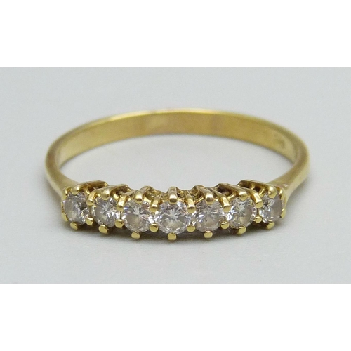 1044 - An 18ct gold and seven stone diamond ring, 2.3g, Q