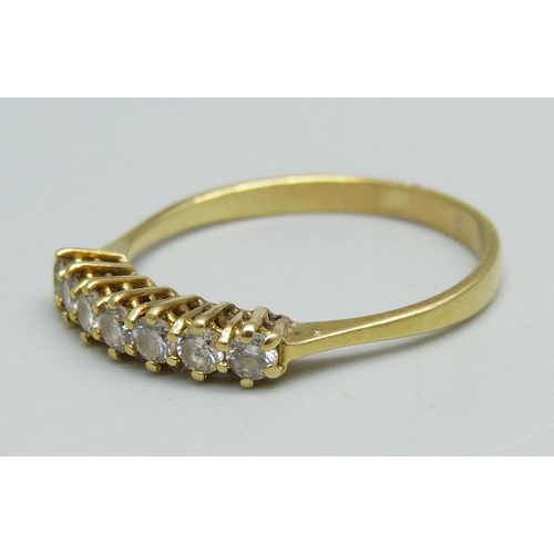 1044 - An 18ct gold and seven stone diamond ring, 2.3g, Q