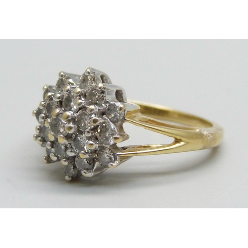 1045 - An 18ct gold and diamond cluster ring, one carat weight, 4.8g, N