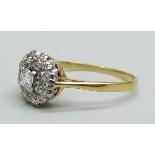 1048 - An 18ct gold and diamond cluster ring, 2.4g, N