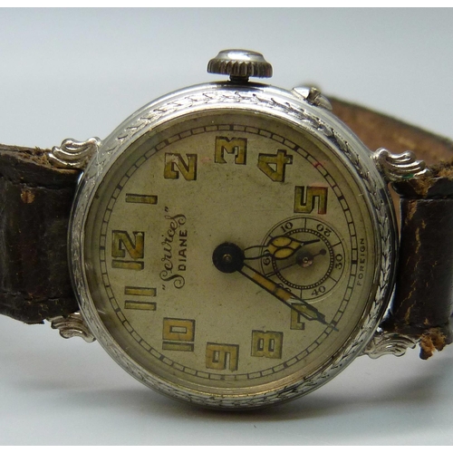 1050 - A silver pocket watch, a Roamer wristwatch movement, a gold plated watch case, and one other wristwa... 