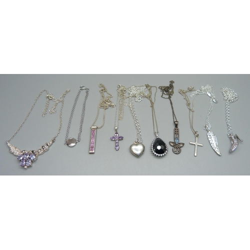 1052 - Eight sterling silver necklaces and pendants, a silver bracelet and an unmarked white metal leaf pen... 