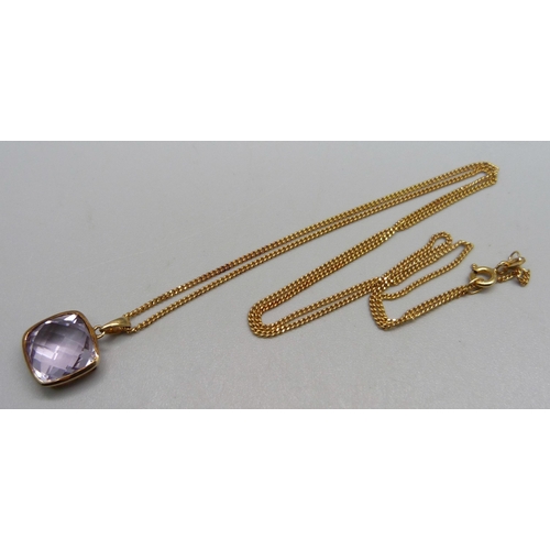 1053 - A 9ct gold necklace and pendant set with an amethyst, 4.4g, 1.8cm pendant, 41.5cm chain