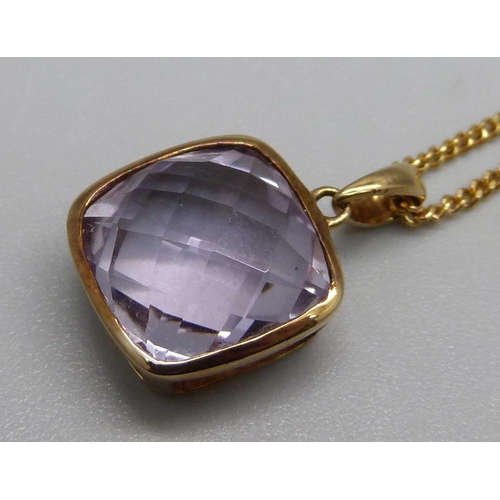 1053 - A 9ct gold necklace and pendant set with an amethyst, 4.4g, 1.8cm pendant, 41.5cm chain