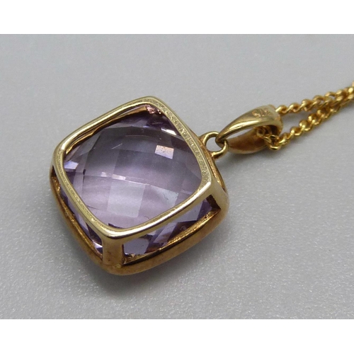 1053 - A 9ct gold necklace and pendant set with an amethyst, 4.4g, 1.8cm pendant, 41.5cm chain