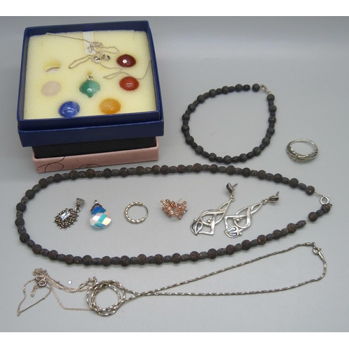 1057 - Two pairs of silver earrings, two silver chains, a silver ring, white metal jewellery including a pa... 