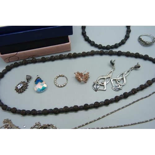 1057 - Two pairs of silver earrings, two silver chains, a silver ring, white metal jewellery including a pa... 