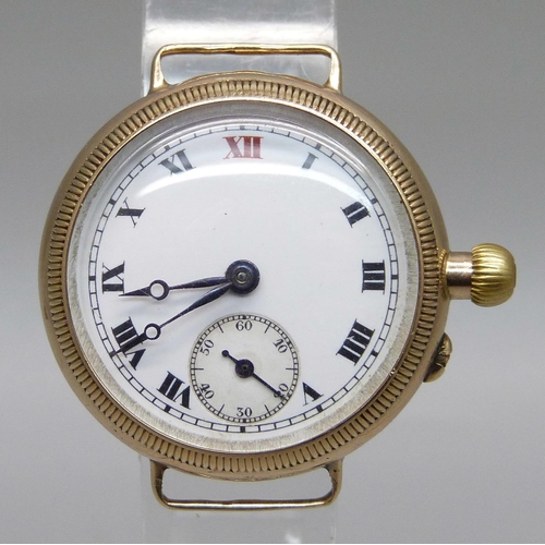 1061 - A 9ct gold cased trench wristwatch head, 21g including movement, 29mm excluding crown