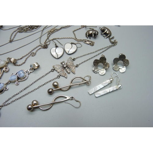 1067 - A collection of silver and stone set jewellery, 122g of marked silver, a white metal mounted shell p... 