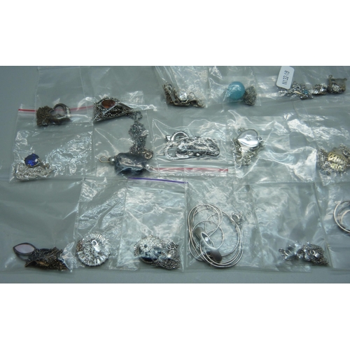 1071 - Eighteen silver pendants and chains, and two silver plated pendants on silver chains