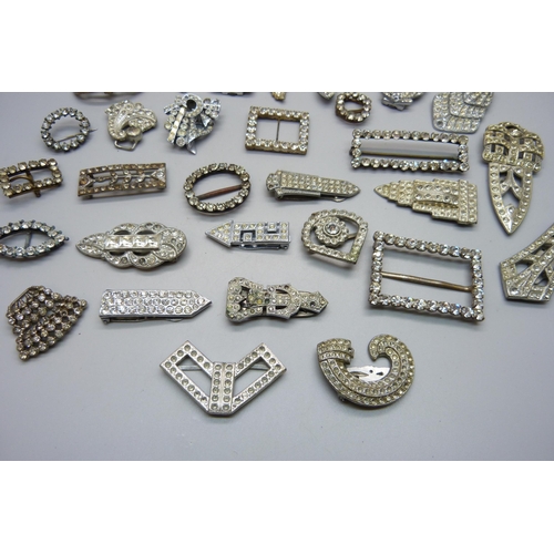 1077 - A collection of paste set clips and buckles etc.