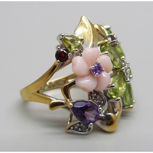 1079 - A silver gilt, pink pearl, zircon, amethyst and peridot dress ring, N/O