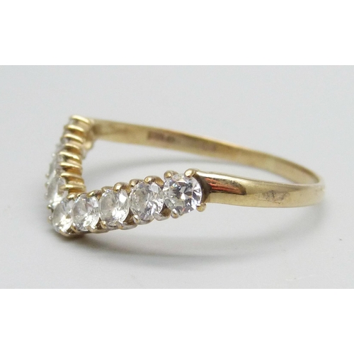 1084 - A 9ct gold wishbone ring set with white stones, 2.2g, X