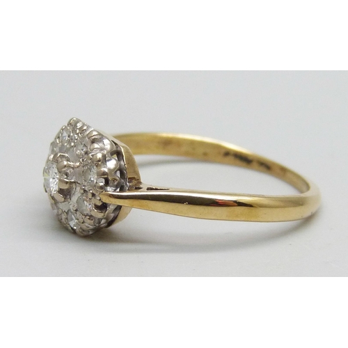 1099 - An 18ct gold diamond cluster ring, 3g, O