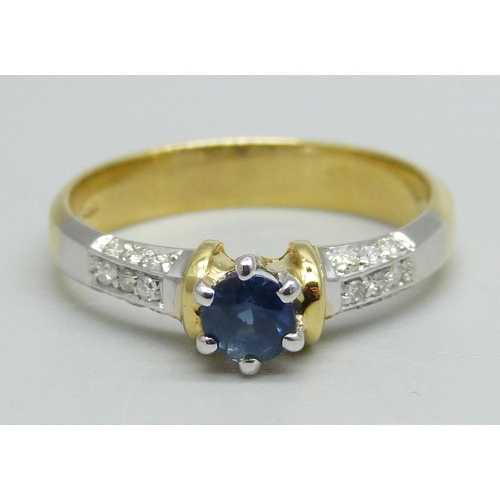 1112 - An 18ct gold, sapphire and diamond ring, 18 diamonds on three sides of shoulders, 4.1g, P/Q