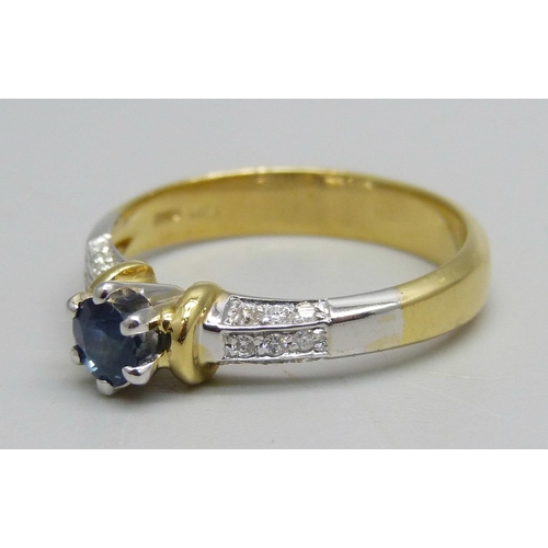 1112 - An 18ct gold, sapphire and diamond ring, 18 diamonds on three sides of shoulders, 4.1g, P/Q