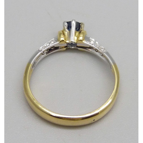 1112 - An 18ct gold, sapphire and diamond ring, 18 diamonds on three sides of shoulders, 4.1g, P/Q