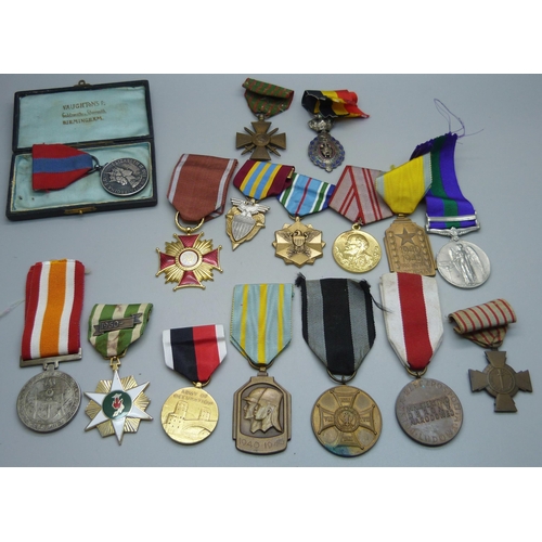 1117 - A collection of medals including a Queen Elizabeth II For Faithful Service Medal to Walter Stanley R... 