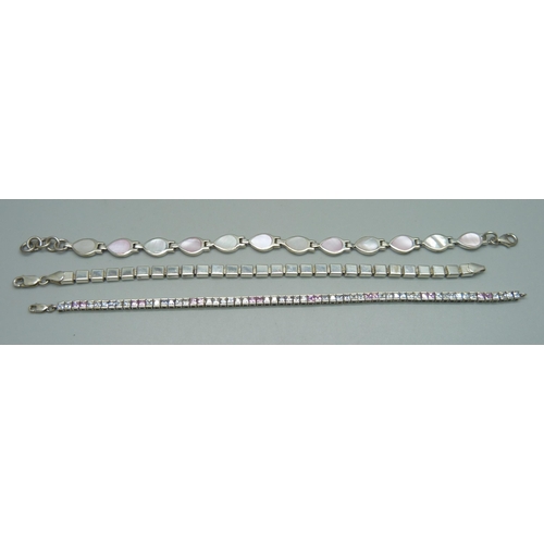 1131 - Three silver bracelets including a pink and white stone line bracelet, 34g total, longest 21.5cm