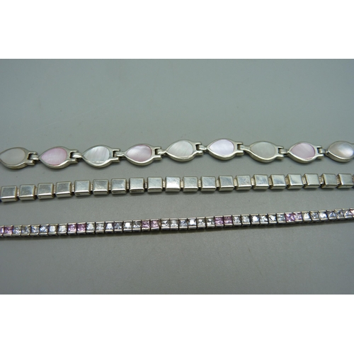 1131 - Three silver bracelets including a pink and white stone line bracelet, 34g total, longest 21.5cm