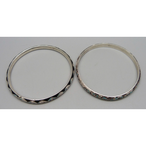 1132 - Two white metal and enamelled bangles, enamel a/f, tests as silver, 27g