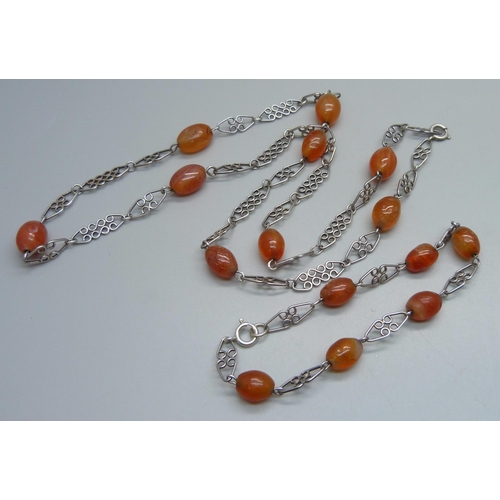 1139 - A silver and carnelian neck chain and bracelet, total weight 43g, bracelet 23cm, necklace approximat... 