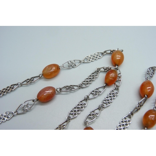 1139 - A silver and carnelian neck chain and bracelet, total weight 43g, bracelet 23cm, necklace approximat... 