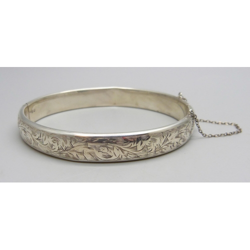 1140 - A Charles Horner silver bangle, Chester 1953, (dented and fastener a/f), 19g