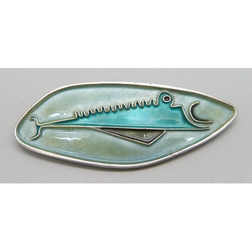 1145 - An abstract design sterling silver enamelled brooch/pendant depicting a fish, maker's mark de P.S., ... 