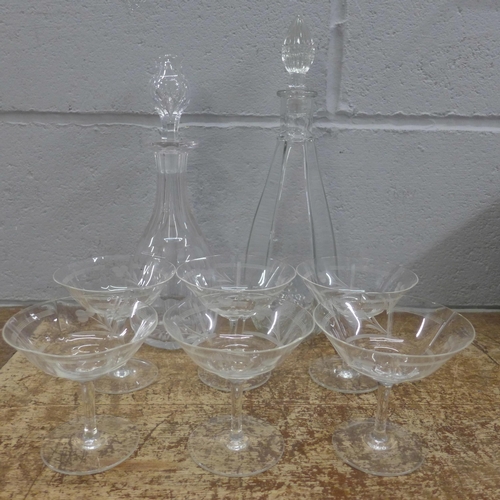 1155 - A set of six etched glass drinking glasses and two decanters including one crystal **PLEASE NOTE THI... 