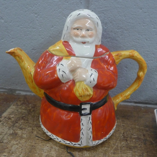 1163 - A Lucky Santa Claus teapot, regd. no. 835842, Sylvac teatime teapot, Midwinter cake stand and glass ... 